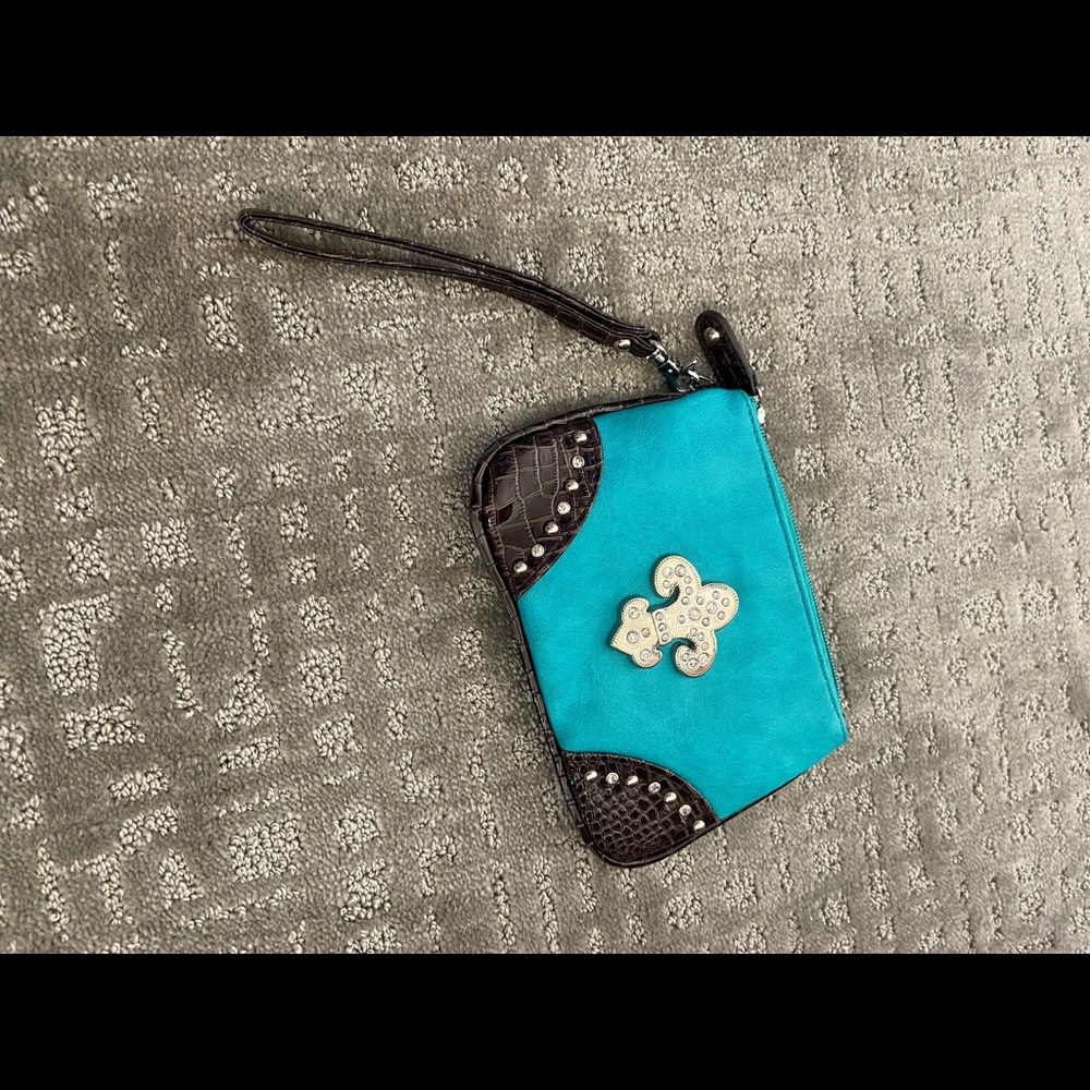 Small suede fleur de lis wristlet